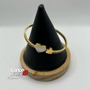 Stunning heart shaped Hinged Gold Tone Bracelet with Mother of Pearl Accent
